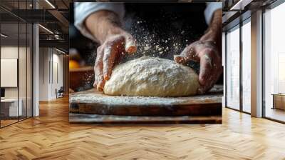 fingers dusted with flour kneading dough on a rustic wooden table a dark moody background adds depth emphasizing the artisan process of preparing bread creating an inviting and homey atmosphere Wall mural