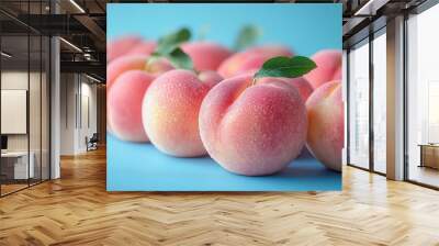 fresh juicy peaches arranged appealingly against a light blue backdrop emphasizing their natural beauty and refreshment crisp lighting enhances colors inviting a sense of summer Wall mural