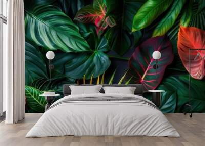 lush tropical foliage in vivid colors against deep black background creating dramatic contrast and emphasizing exotic leaf shapes and textures Wall mural