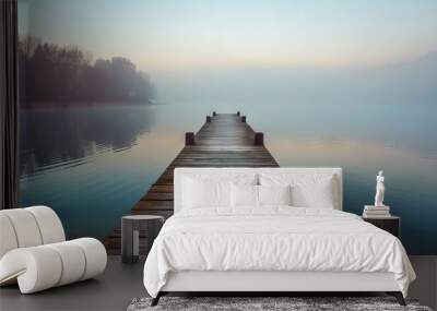 serene wooden pier extending into misty lake at dawn tranquil landscape photography Wall mural