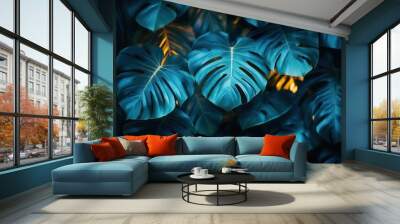 tropical leaves illuminated by captivating blue and green hues creating an exotic and vibrant atmosphere that evokes a sense of adventure and connection to nature Wall mural