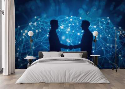 two silhouetted figures shake hands surrounded by a glowing network of interconnected nodes blue tones dominate symbolizing trust and technological advancement in business relationships Wall mural