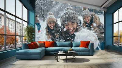 winter wonderland fun group of girlfriends enjoying playful snowball fight in park laughter and joy Wall mural