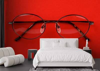 Classic glasses on a red background. Wall mural