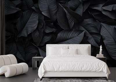 Closeup tropical black leaves texture and dark tone process, abstract nature pattern background Wall mural