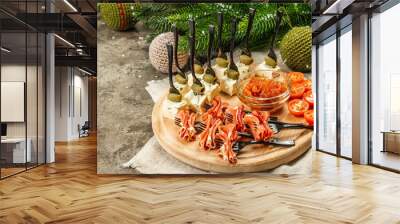 A set of New Year's snacks for a buffet table. Blue cheese, Jamon, olives. Festive food concept Wall mural