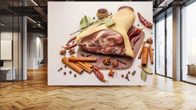 Raw pork meat - hock, knuckle or leg. Traditional ingredient for eisbein. Fresh meat, dry spices and vegetables Wall mural