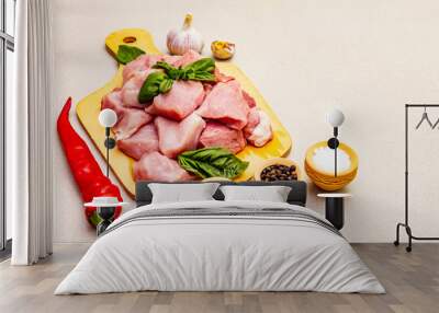 Raw pork neck, cut into pieces with fresh vegetables and dry spice Wall mural