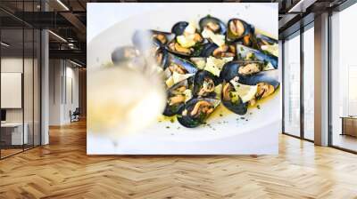 Ancona Marche Cozze di Portonovo or cozze del Conero called Moscioli whit marinara sauce with garlic parsley and chilli pepper and Verdicchio wine Wall mural