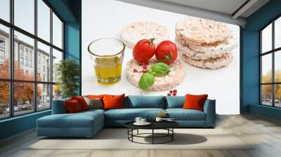 Gallette di riso o rice crackers on white background isolated whit tomatoes extra virgin oil and salt Wall mural