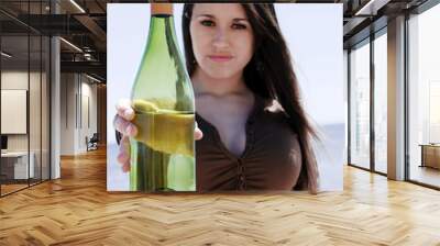 Girl showing a bottle Wall mural