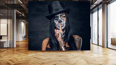  A woman with skull make up. Wall mural