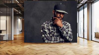 African-American bearded guy wearing a checkered shirt and cap Wall mural