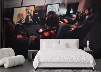 Busy team of gamers has an cyber championship with onother gamers. Wall mural