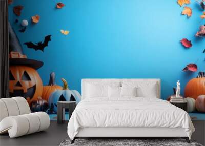 Halloween pumpkins and ghost decorations on blue backdrop Wall mural