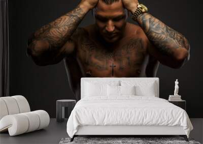 Muscular man with tattooes Wall mural