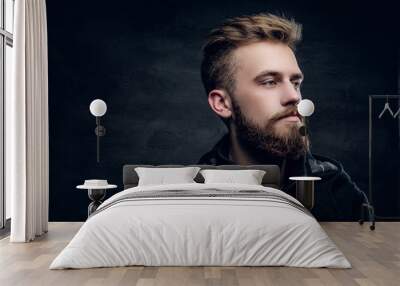 Portrait of bearded stylish young male. Wall mural