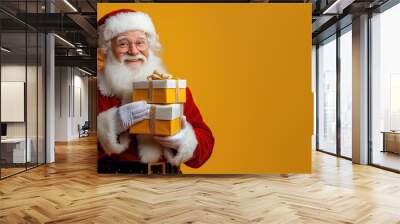 Santa holding two gifts, spreading festive joy Wall mural