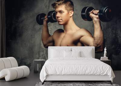 Shirtless young bodybuilder. Wall mural