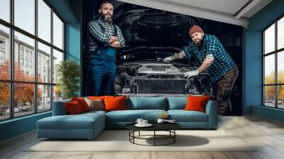 Two men in a garage. Wall mural