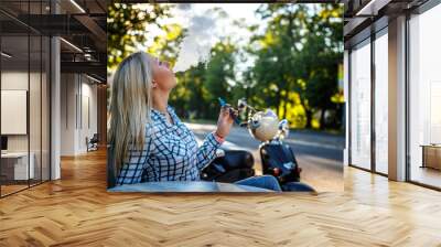 Woman smoking sigarette. Wall mural