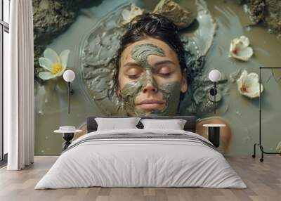 A relaxing mud bath spa treatment featuring a woman surrounded by therapeutic clay and natural elements. Wall mural