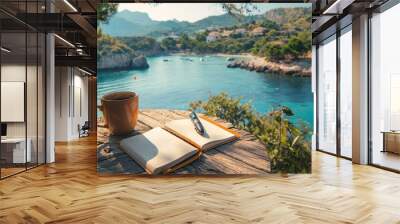 Travel Journal, An open journal with a pen and a cup of coffee on a table overlooking a scenic vacation spot. Wall mural