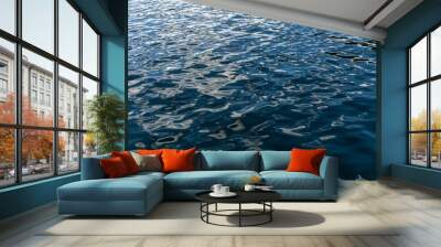 Dark blue water surface from the lake with slight waves. Wall mural