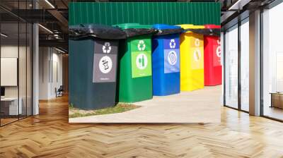 separate garbage collection. waste recycling concept. containers for metal, glass, paper, organics,  Wall mural