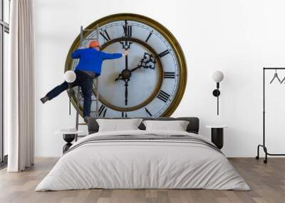 Man is standing on a ladder and adjusting the clock Wall mural