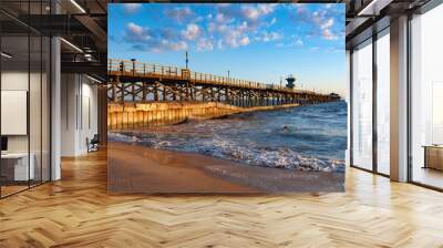 Sunset light hitting seal beach pier in  southern California Wall mural