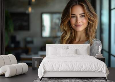 A professional photo of an attractive female business manager in her office, smiling and standing with crossed arms on the table, wearing a white blouse and blue skirt, with a modern interior design Wall mural