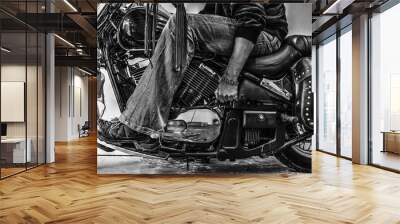 biker starting a motorcycle in black and white Wall mural