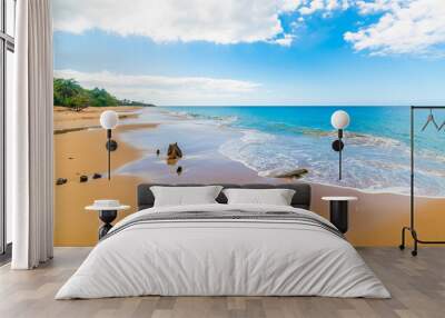 Golden sand and blue sea in La Perle beach in Guadeloupe Wall mural