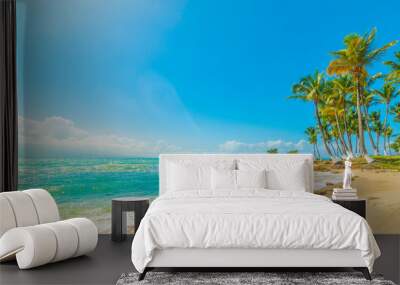 Sand and rocks and blue sea in a tropical beach Wall mural