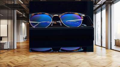 glasses with case. Photo of glasses with purple reflection with box Wall mural