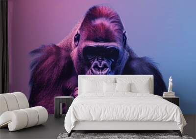 Gorilla and game pad on neon style gradient background Wall mural