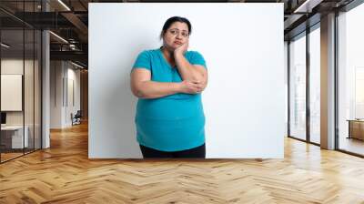 Overweight fat indian woman feeling sad isolated over white background. Plus size female. Healthcare Concept. Copy Space Wall mural