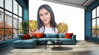 Young asian girl holding two fresh coconut water with straw Isolated on White Background, summer drink, dehydration - Image Wall mural