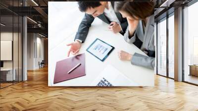 a businessman and woman brainstorming Wall mural