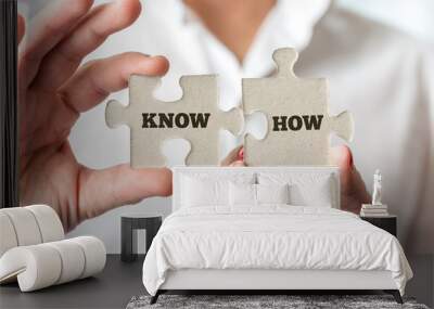 hands holding puzzle pieces for know how concept Wall mural