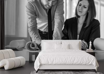 Monochrome image of architects at work in their office Wall mural