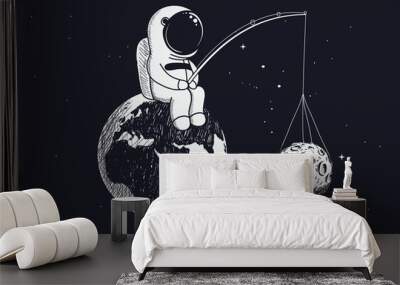 little astronaut sits on the Earth and keeps Moon Wall mural