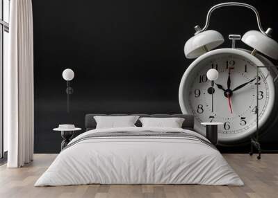 Classic Alarm Clock on Black Background Wall mural