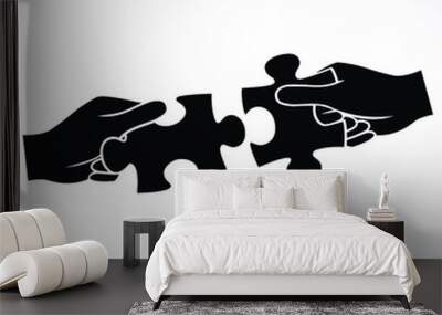 Hands assembling jigsaw puzzle pieces together Wall mural