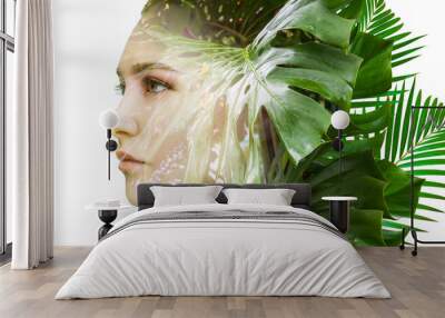 Double exposure of woman and tropical plants on white background. Wall mural