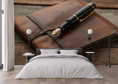 A black fountain pen on a brown leather bound journal. Wall mural