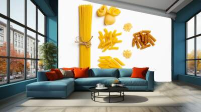 Raw italian spaghetti and pasta on a white background Wall mural