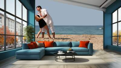 couple dancing on the beach Wall mural