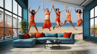 five girls jumping Wall mural